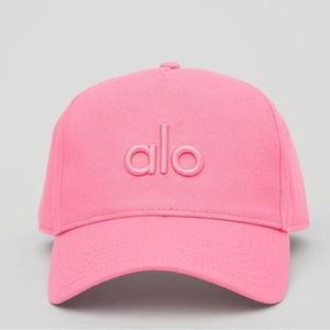 Alo District Trucker hat in candy pink